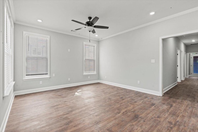 unfurnished room with ceiling fan, dark wood-type flooring, and crown molding