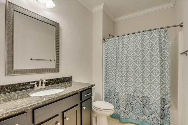 bathroom featuring tile patterned flooring, ornamental molding, vanity, and toilet