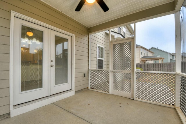 view of patio featuring french doors and ceiling fan