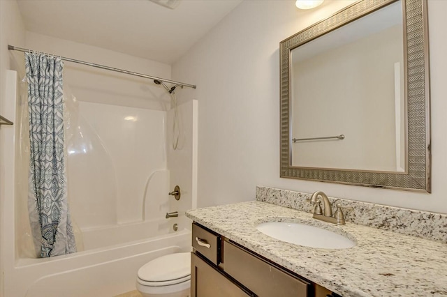 full bathroom with shower / bath combination with curtain, vanity, and toilet