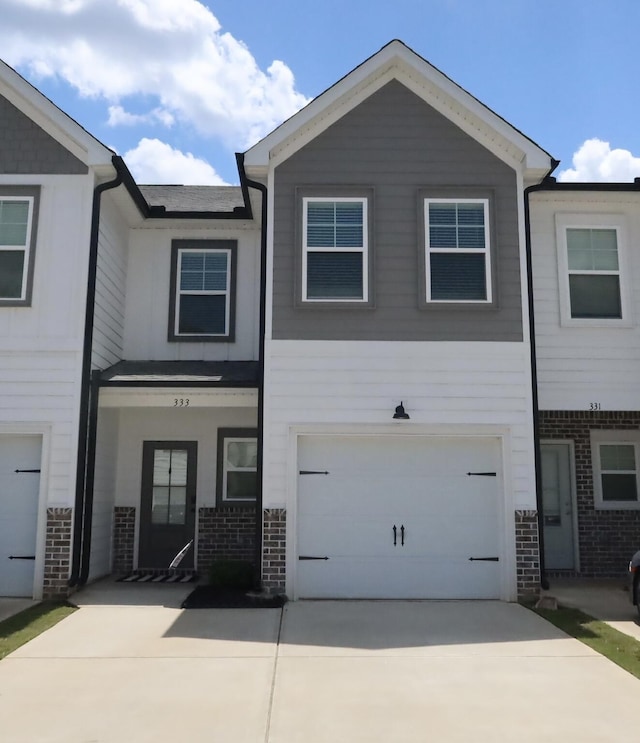 333 Sumac Trl, Evans, GA 30809 - view of front facade featuring brick siding, driveway, and a garage