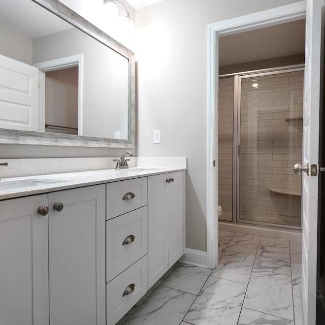 333 Sumac Trl, Evans, GA 30809 - bathroom featuring vanity, marble finish flooring, and a shower stall