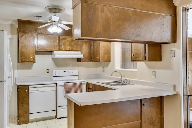 3414 Forest Estates Dr, Augusta, GA 30909 - kitchen featuring white appliances, premium range hood, ceiling fan, a peninsula, and brown cabinets