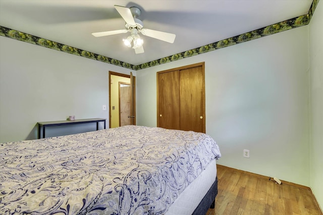 3414 Forest Estates Dr, Augusta, GA 30909 - bedroom with a closet, hardwood / wood-style flooring, and a ceiling fan