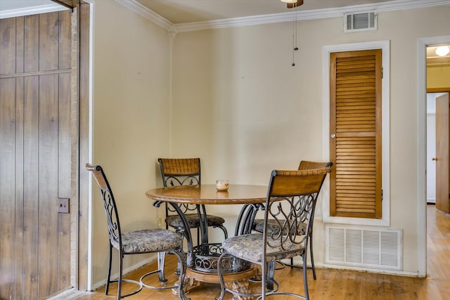 3414 Forest Estates Dr, Augusta, GA 30909 - dining room featuring crown molding and wood finished floors