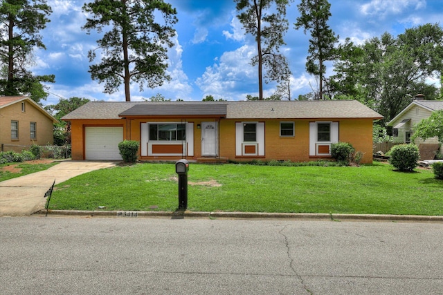 3414 Forest Estates Dr, Augusta, GA 30909 - ranch-style home featuring an attached garage, a front lawn, and concrete driveway