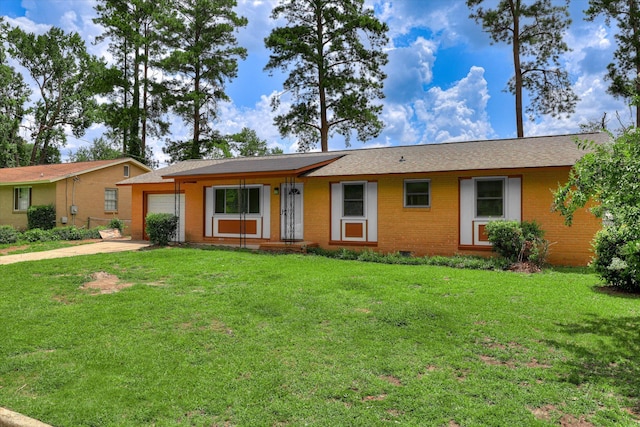 3414 Forest Estates Dr, Augusta, GA 30909 - ranch-style house featuring concrete driveway, an attached garage, and a front yard