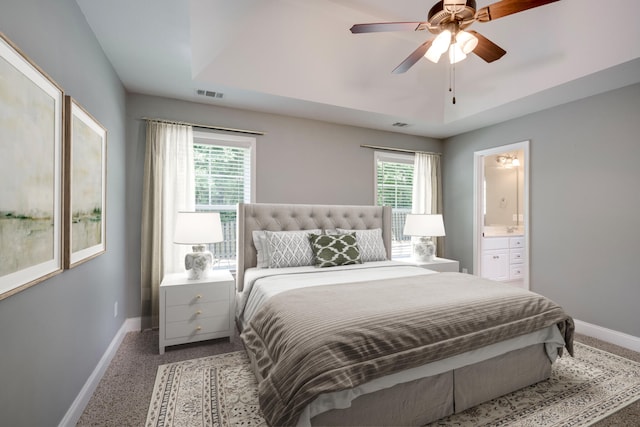 3113 Sunset Maple Trl, Evans, GA 30809 - carpeted bedroom with multiple windows, connected bathroom, and ceiling fan