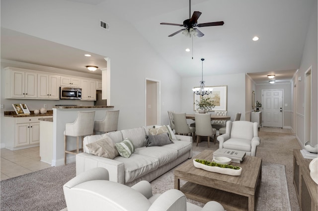 3113 Sunset Maple Trl, Evans, GA 30809 - living area with light colored carpet, high vaulted ceiling, a chandelier, recessed lighting, and a ceiling fan