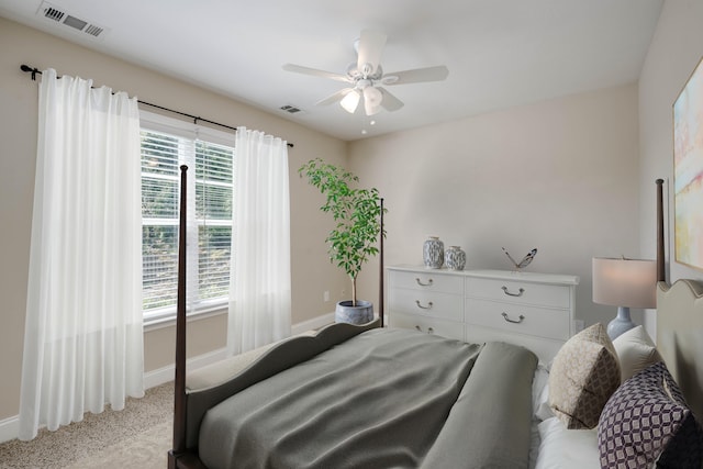 3113 Sunset Maple Trl, Evans, GA 30809 - bedroom with multiple windows, a ceiling fan, and light colored carpet