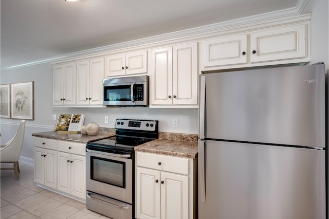 3113 Sunset Maple Trl, Evans, GA 30809 - kitchen with stainless steel appliances, light tile patterned flooring, and ornamental molding