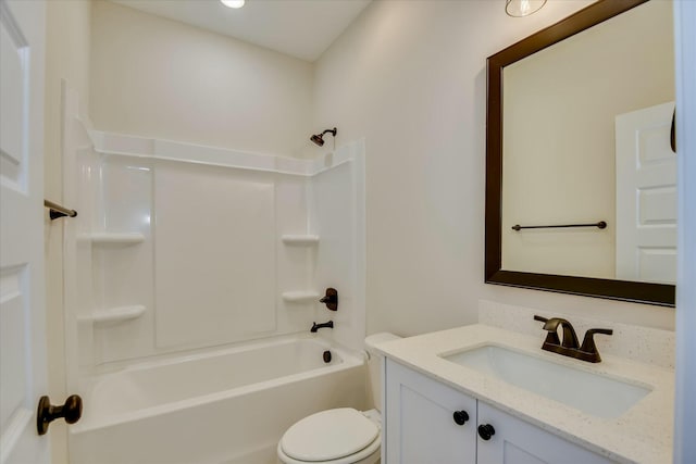 bathroom featuring toilet, shower / bath combination, and vanity