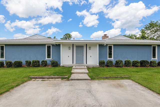 4067 Flintrock Way, Martinez, GA 30907 - ranch-style home with a chimney, a front lawn, and stucco siding