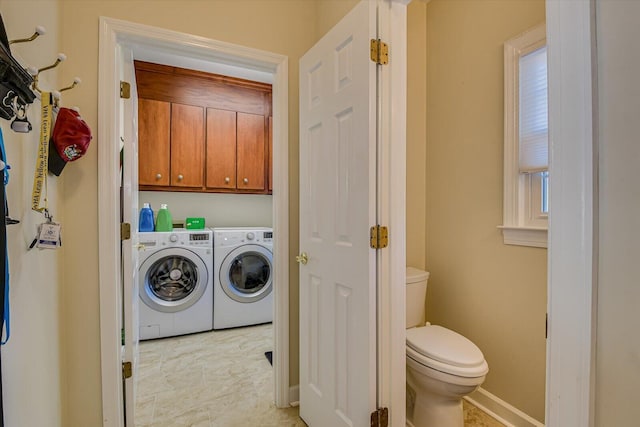 laundry room featuring washer and dryer and cabinet space