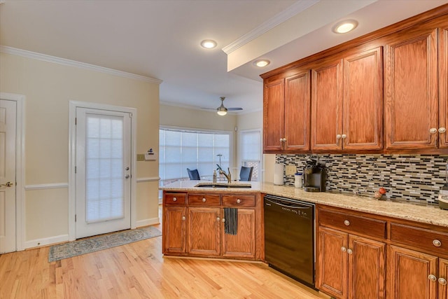 kitchen featuring crown molding, brown cabinetry, and dishwasher