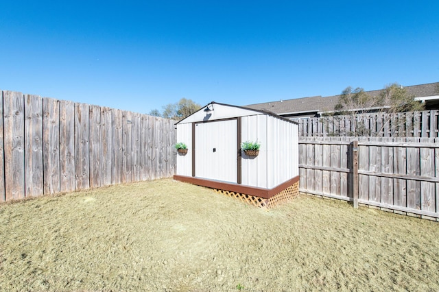 view of outbuilding with a yard