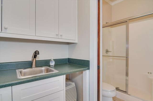 1020 Peninsula Xing, Evans, GA 30809 - full bath featuring a stall shower, toilet, ornamental molding, and vanity