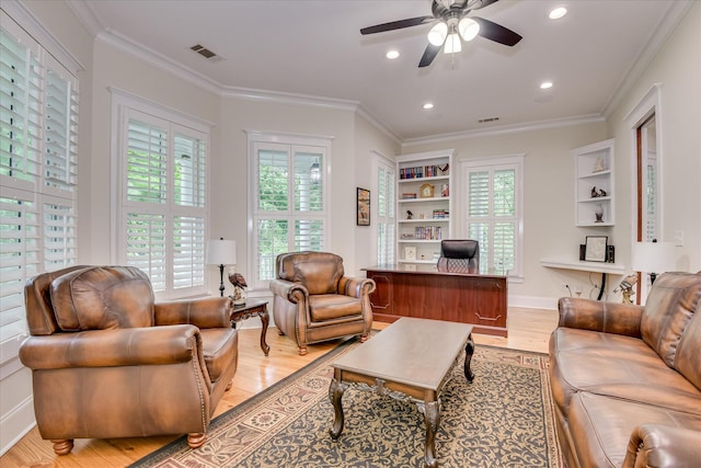 1020 Peninsula Xing, Evans, GA 30809 - living room featuring light wood-style floors, a ceiling fan, a desk, ornamental molding, and recessed lighting