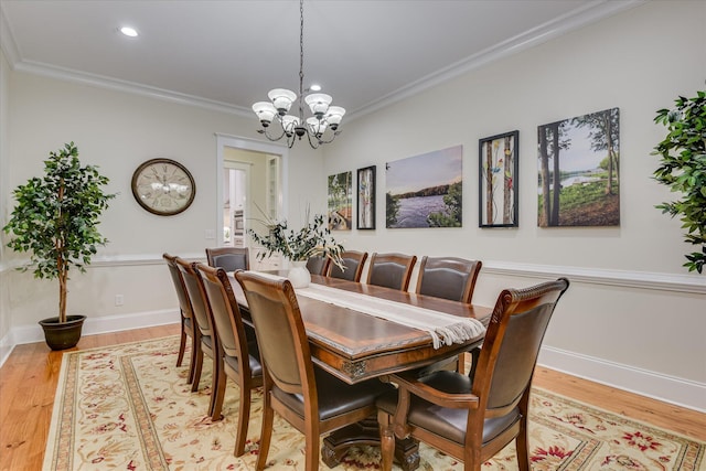 1020 Peninsula Xing, Evans, GA 30809 - dining space featuring a chandelier, crown molding, light wood finished floors, recessed lighting, and baseboards