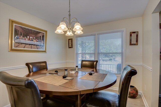 dining area with light hardwood / wood-style flooring and a wealth of natural light