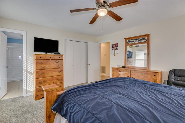 carpeted bedroom with ceiling fan