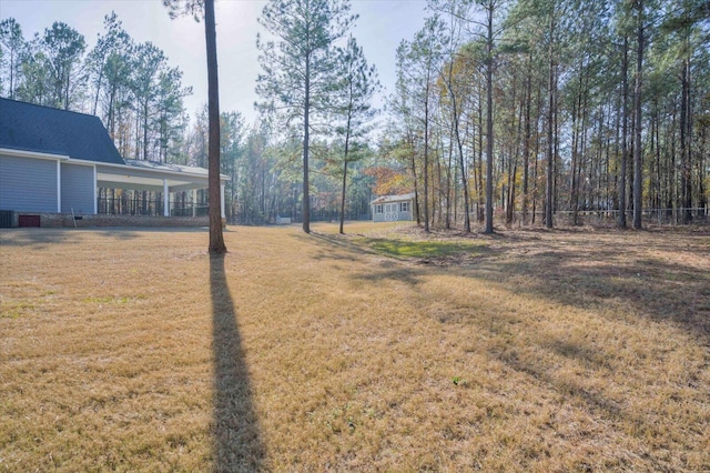 view of yard featuring a carport