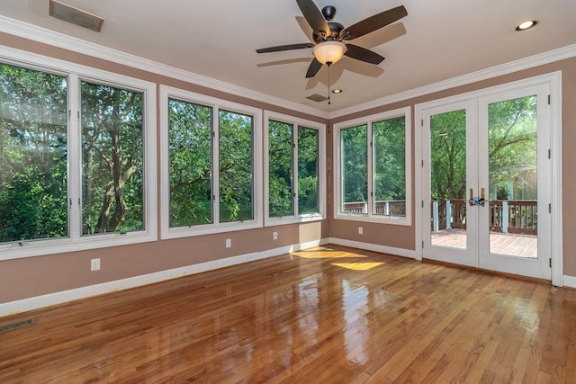 2531 Tupelo Dr, Augusta, GA 30909 - unfurnished sunroom with french doors, plenty of natural light, wood-type flooring, ornamental molding, and recessed lighting
