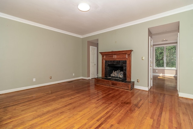 2531 Tupelo Dr, Augusta, GA 30909 - unfurnished living room featuring light wood-style floors, ornamental molding, and a premium fireplace