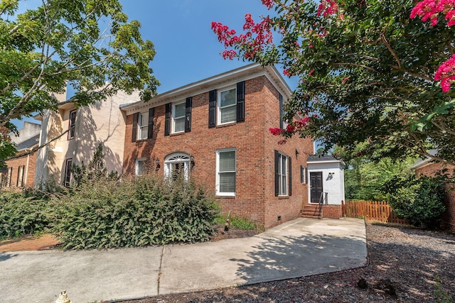 2531 Tupelo Dr, Augusta, GA 30909 - colonial-style house featuring brick siding, entry steps, and crawl space