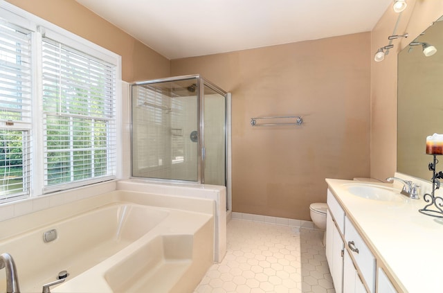 2531 Tupelo Dr, Augusta, GA 30909 - full bathroom with healthy amount of natural light, tile patterned flooring, a garden tub, and a stall shower
