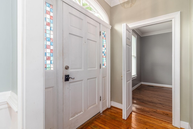 2531 Tupelo Dr, Augusta, GA 30909 - entryway with ornamental molding, wood finished floors, and healthy amount of natural light