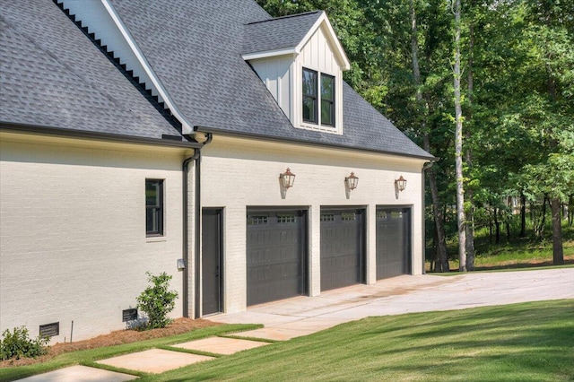 garage with a lawn