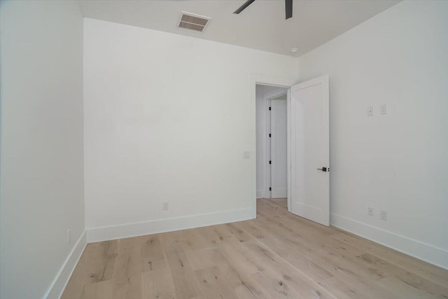 unfurnished room with ceiling fan and light hardwood / wood-style flooring