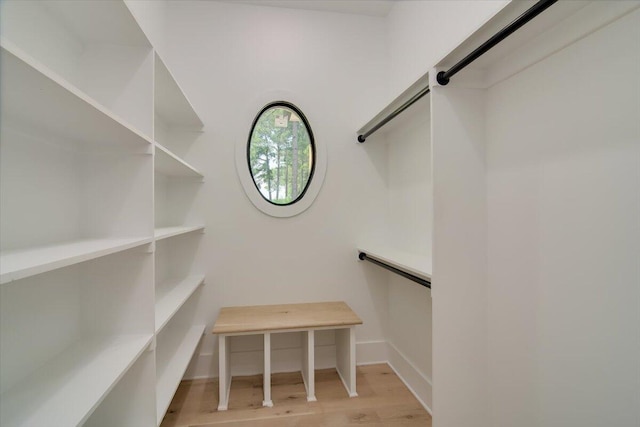 walk in closet featuring light wood-type flooring