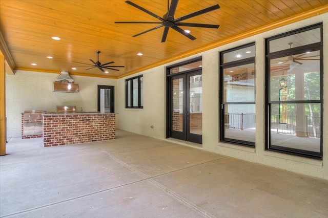 view of patio / terrace featuring exterior bar and french doors