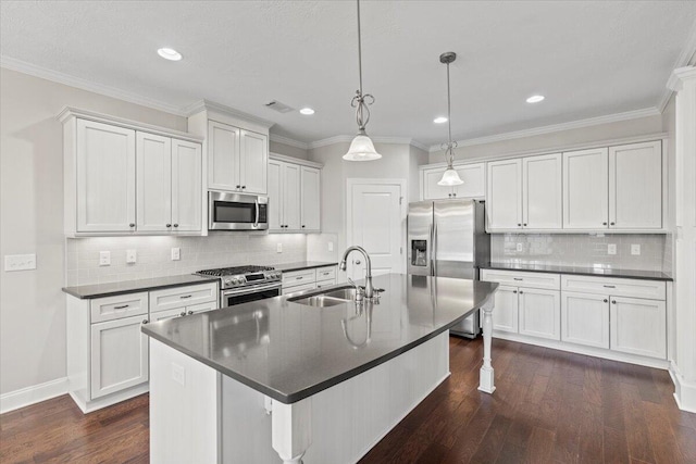 kitchen featuring white cabinets, sink, and stainless steel appliances