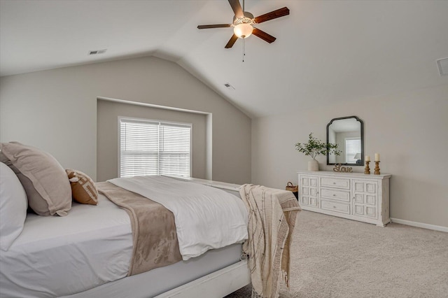 bedroom featuring visible vents, carpet floors, lofted ceiling, and ceiling fan