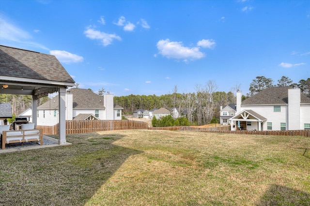 view of yard with fence