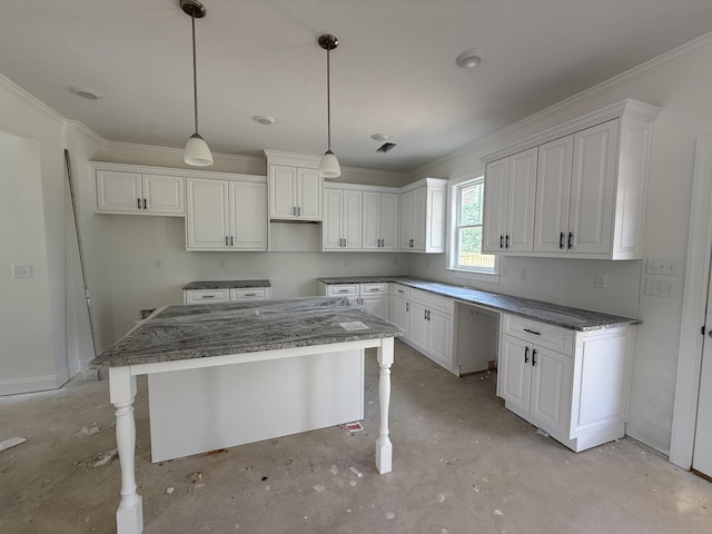 930 Walker Point Dr Unit Tp11, Grovetown, GA 30813 - kitchen featuring crown molding, white cabinetry, a center island, pendant lighting, and concrete flooring