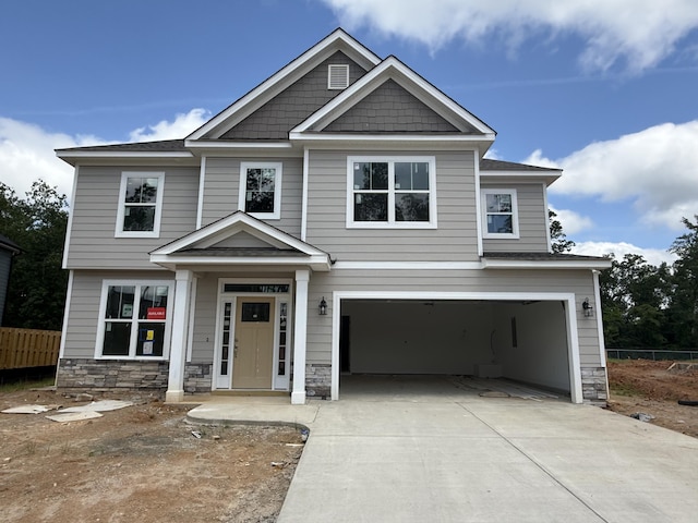 930 Walker Point Dr Unit Tp11, Grovetown, GA 30813 - view of front of house featuring a garage, concrete driveway, and stone siding
