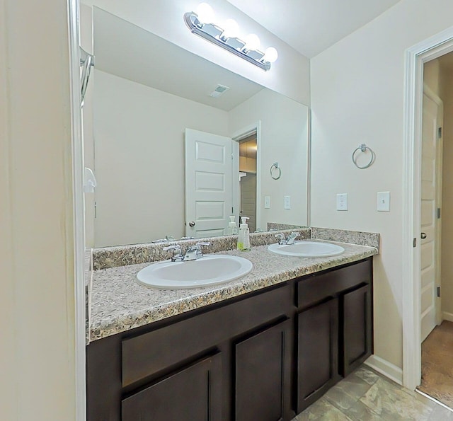 4706 Southwind Rd, Evans, GA 30809 - full bath featuring double vanity and baseboards