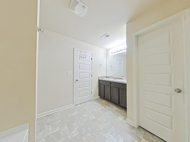 4706 Southwind Rd, Evans, GA 30809 - bathroom with double vanity and baseboards