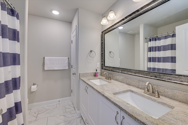 full bathroom featuring marble finish flooring, baseboards, double vanity, recessed lighting, and a shower with curtain