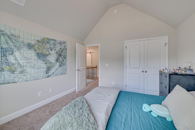 bedroom featuring carpet, baseboards, high vaulted ceiling, and a closet