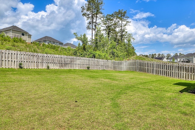 view of yard featuring a residential view