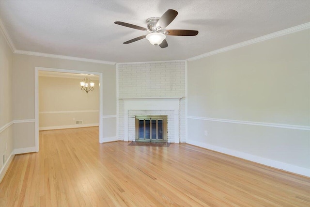 427 Ashland Dr, Augusta, GA 30909 - unfurnished living room with wood finished floors, a chandelier, a ceiling fan, a textured ceiling, and a fireplace