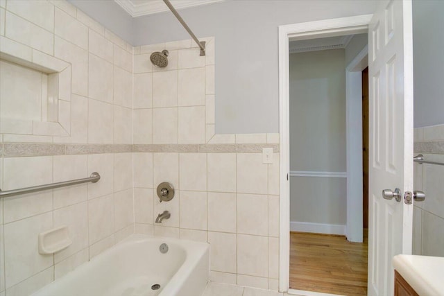 427 Ashland Dr, Augusta, GA 30909 - bathroom featuring bathing tub / shower combination, ornamental molding, wood finished floors, and vanity