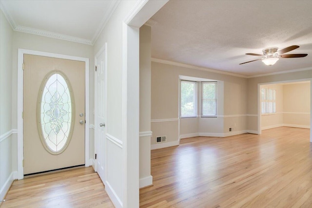 427 Ashland Dr, Augusta, GA 30909 - entrance foyer with light wood-type flooring, healthy amount of natural light, ornamental molding, and a ceiling fan