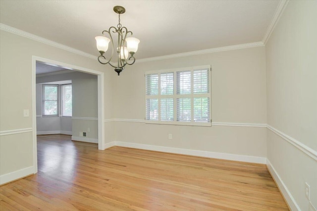 427 Ashland Dr, Augusta, GA 30909 - unfurnished room with light wood-style floors, a chandelier, and crown molding