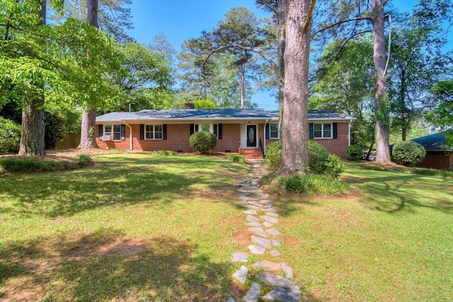 427 Ashland Dr, Augusta, GA 30909 - ranch-style home featuring a front lawn, brick siding, and a chimney